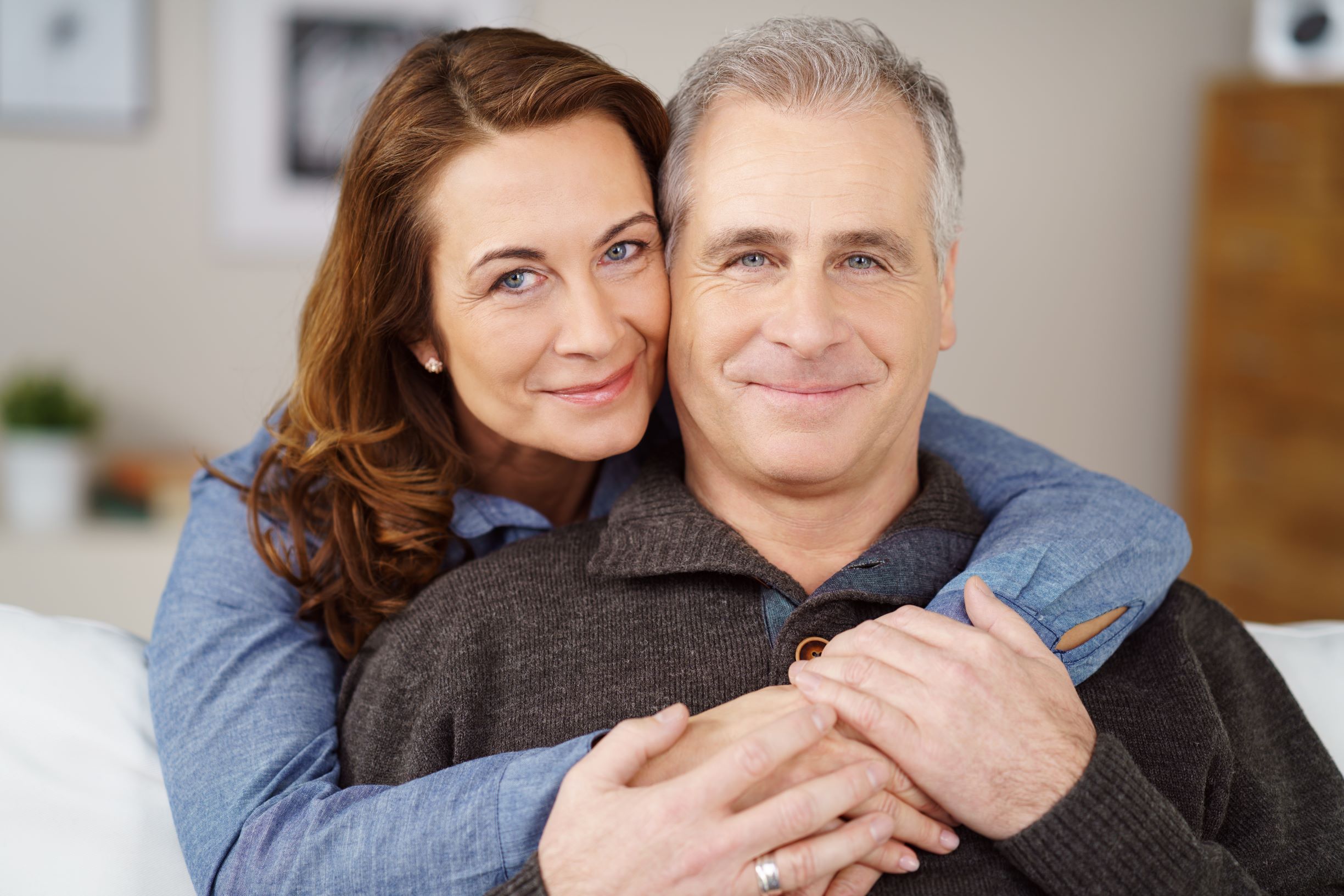 Casual loving husband and wife multi racial couple portrait stock photo